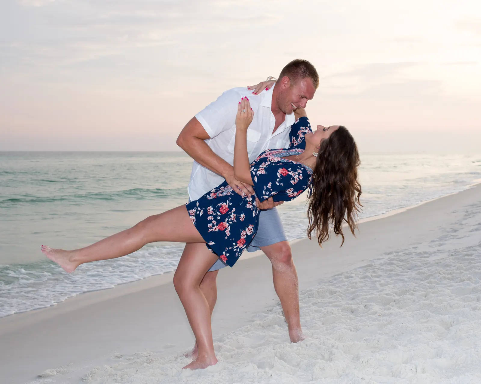 Couple dancing on the beach