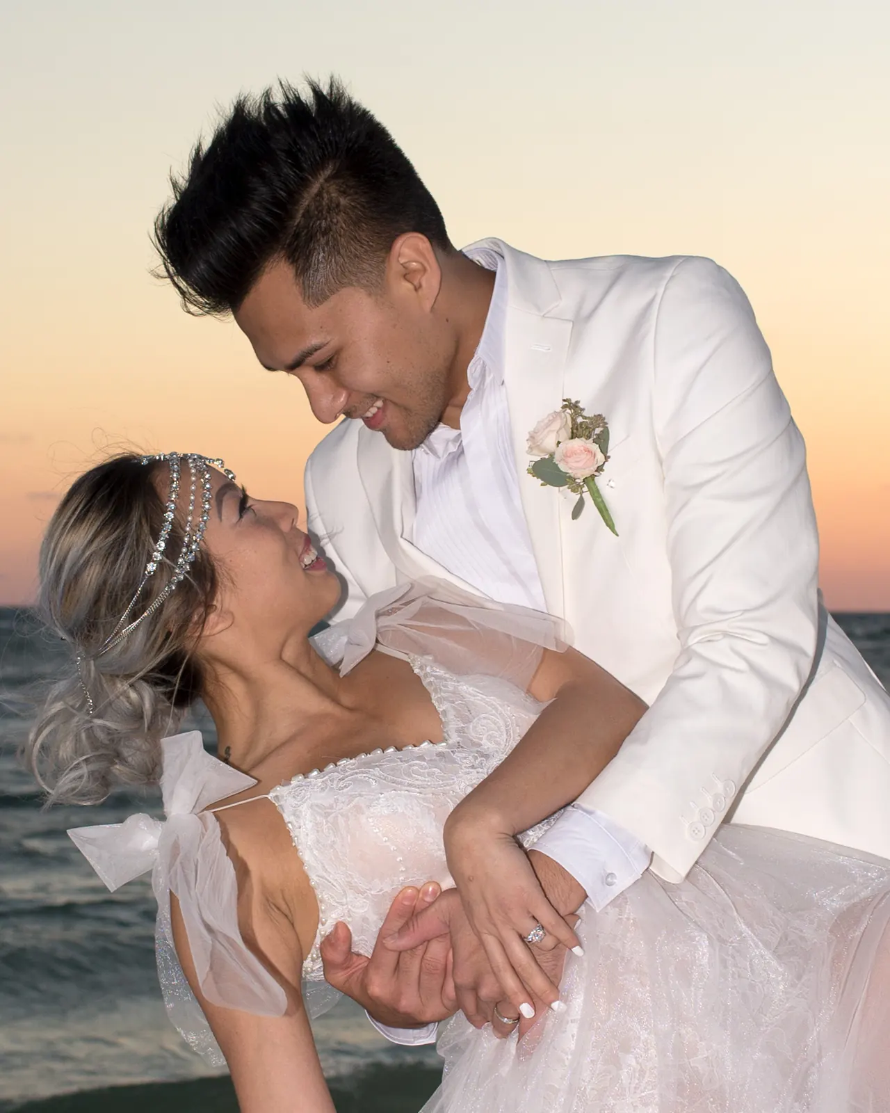 Wedding couple embrace