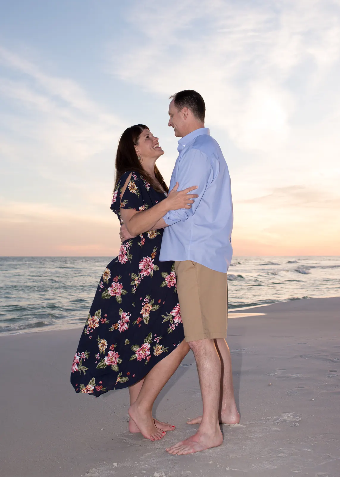 Couple embracing on the shoreline